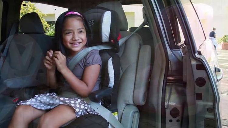 Child in a safety seat