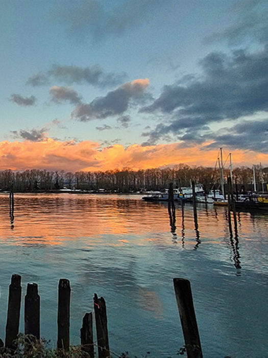 Sunrise on the Columbia River with snow in the foreground